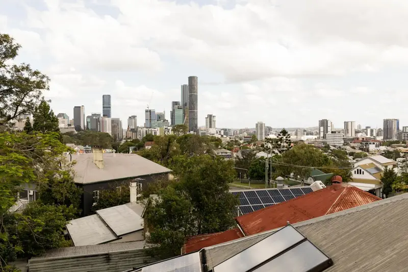 View over Red Hill rooftops to the Brisbane city skyline